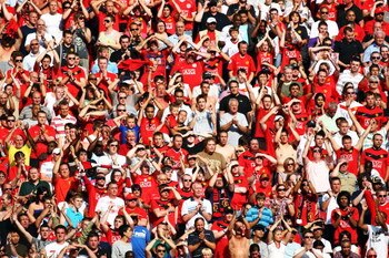 LONDON, ENGLAND - AUGUST 09:  Manchester United fans look on during the FA Community Shield match between Manchester United and Chelsea at Wembley Stadium on August 9, 2009 in London, England.  (Photo by Phil Cole/Getty Images)