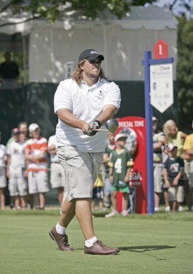 UNITED STATES - JULY 19:  Green Bay Packers tackle Mark Tauscher plays at the Charity Golf Shoot-Out, a six hole event that is part of the PGA's Drive To A Billion, before the 2005 US Bank Championship at Brown Deer Park in Milwaukee, Wisconsin on July 19