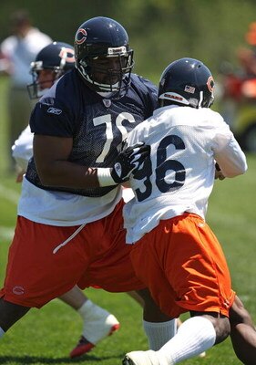 LAKE FOREST, IL - MAY 20: Orlando Pace #76 of the Chicago Bears blocks Alex Brown #96 during an organized team activity (OTA) practice on May 20, 2009 at Halas Hall in Lake Forest, Illinois. (Photo by Jonathan Daniel/Getty Images)