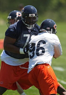 LAKE FOREST, IL - MAY 20: Orlando Pace #76 of the Chicago Bears blocks Alex Brown #96 during an organized team activity (OTA) practice on May 20, 2009 at Halas Hall in Lake Forest, Illinois. (Photo by Jonathan Daniel/Getty Images)