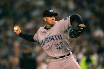 NEW YORK - APRIL 01:  Starting pitcher Roy Halladay #32 of the Toronto Blue Jays pitches against the New York Yankees during Opening Day at Yankee Stadium April 1, 2008 in the Bronx borough of New York City.  (Photo by Chris Trotman/Getty Images)