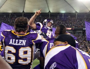 MINNEAPOLIS - DECEMBER 28:   Ryan Longwell #8 of the Minnesota Vikings  is hoisted up by teammates after he kicked the game winning field goal against the New York Giants on December 28,2008 at the Hubert H. Humphrey Metrodome in Minneapolis, Minnesota. T