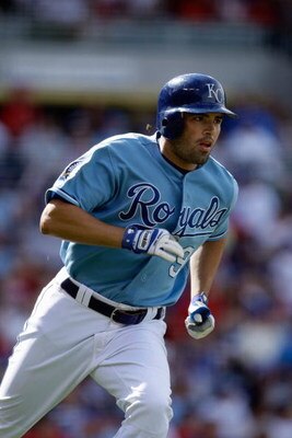 KANSAS CITY, MO - JUNE 20:  David DeJesus #9 of the Kansas City Royals runs to first against the St. Louis Cardinals during the game on June 20, 2009 at Kauffman Stadium in Kansas City, Missouri. (Photo by Jamie Squire/Getty Images)