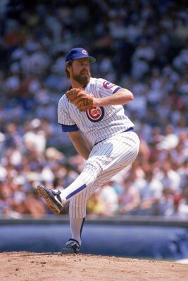 CHICAGO - 1989:  Rick Sutcliffe #40 of the Chicago Cubs winds back to pitch during a game in the 1989 season at Wrigley Field in Chicago, Illinois . ( Photo by: Jonathan Daniel/Getty Images )