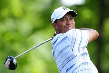 CHASKA, MN - AUGUST 14:  Tiger Woods watches a tee shot during the second round of the 91st PGA Championship at Hazeltine National Golf Club on August 14, 2009 in Chaska, Minnesota.  (Photo by Stuart Franklin/Getty Images)