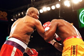 5 Nov 1994: George Foreman throws a punch during a fight against Michael Moorer in Las Vegas, Nevada.. Foreman defeated Moorer by a TKO in the 10th round. Mandatory Credit: Holly  Stein  /Allsport