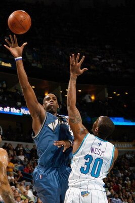 NEW ORLEANS - DECEMBER 30:  Antawn Jamison #4 of the Washington Wizards takes a shot over David West #30 of the New Orleans Hornets on December 30, 2008 at the New Orleans Arena in New Orleans, Louisiana.  NOTE TO USER: User expressly acknowledges and agr