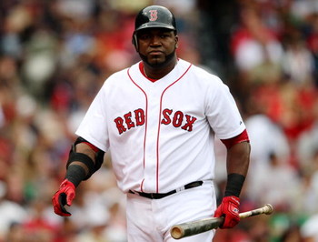 BOSTON - AUGUST 13: David Ortiz #34 of the Boston Red Sox reacts after striking out in the ninth inning during the game against the Detroit Tigers at Fenway Park on August 13, 2009 in Boston, Massachusetts. (Photo by Elsa/Getty Images)