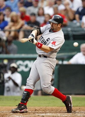 ARLINGTON, TX - JULY 22:  Jason Varitek #33 of the Boston Red Sox swings for a strike during the game against the Texas Rangers at Rangers Ballpark July 22, 2009 in Arlington, Texas.  (Photo by Ronald Martinez/Getty Images)