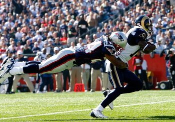 FOXBORO, MA - OCTOBER 26:  Donnie Avery #17 of the St. Louis Rams is stopped by Jonathan Wilhite #24 of the New England Patriots at Gillette Stadium on October 26, 2008 in Foxboro, Massachusetts.  (Photo by Jim Rogash/Getty Images)