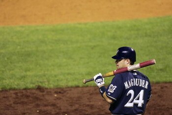 DENVER - AUGUST 16:  Pinch hitter Chris Magruder #24 of the Milwaukee Brewers waits for his at-bat against the Colorado Rockies in the ninth inning on August 16, 2005 at Coors Field in Denver, Colorado. The Brewers defeated the Rockies 6-4.  (Photo by Bri