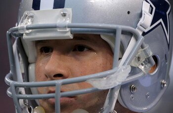 DENVER - AUGUST 16:  Quarterback Tony Romo #9 of the Dallas Cowboys takes the field against the Denver Broncos during preseason NFL action at Invesco Field at Mile High on August 16, 2008 in Denver, Colorado. The Broncos defeated the Cowboys 23-13.  (Phot