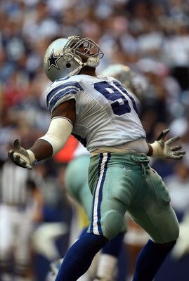 IRVING, TX - OCTOBER 05:  Tackle Jay Ratliff #90 of the Dallas Cowboys celebrates a defensive tackle against Cedric Benson #32 of the Cincinnati Bengals at Texas Stadium on October 5, 2008 in Irving, Texas.  (Photo by Ronald Martinez/Getty Images)