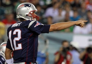 PHILADELPHIA - AUGUST 13:  Tom Brady #12 of the New England Patriots directs his offense against the Philadelphia Eagles on August 13, 2009 at Lincoln Financial Field in Philadelphia, Pennsylvania.  (Photo by Jim McIsaac/Getty Images)