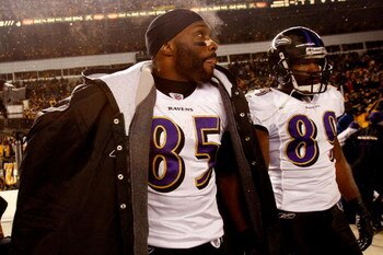 PITTSBURGH - JANUARY 18:  (L-R) Derrick Mason #85 and Mark Clayton #89 of the Baltimore Ravens stand on the field dejected after their 23-14 loss against the Pittsburgh Steelers during the AFC Championship game on January 18, 2009 at Heinz Field in Pittsb