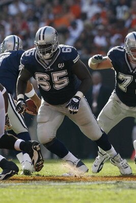 CLEVELAND - SEPTEMBER 7:  Andre Gurode #65 of the Dallas Cowboys blocks during the game against the Cleveland Browns at Cleveland Browns Stadium on September 7, 2008 in Cleveland, Ohio.  (Photo by Kevin C. Cox/Getty Images)