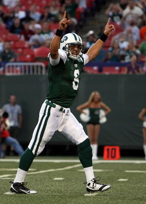 EAST RUTHERFORD, NJ - AUGUST 14: Mark Sanchez #6 of the New York Jets celebrates his first touchdown during the preseason game against the St. Louis Rams at Giants Stadium on August 14, 2009 in East Rutherford, New Jersey. (Photo by Nick Laham/Getty Im