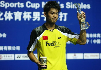 SHANGHAI, CHINA - NOVEMBER 23: (CHINA OUT) Lin Dan of China celebrates with his trophies after winning the men's singles finals badminton match against Chong Wei Lee of Malaysia during the 2008 Li-Ning China Open BWF Super Series on November 23, 2008 in S