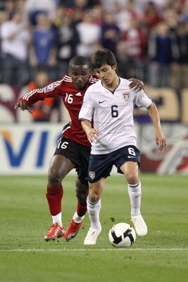 NASHVILLE, TN - APRIL 1:  Jose Francisco Torres #6 of the United States controls the ball under pressure from Khaleem Hyland #16 of Trinidad and Tobago during a FIFA 2010 World Cup Qualifying match on April 1, 2009 at LP Field in Nashville, Tennessee. The