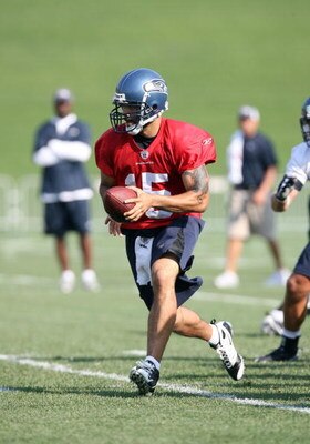 RENTON, WA - JULY 31:  Back-up quarterback Seneca Wallace #15 looks to hand the ball off during training camp at the Seahawks training facility on July 31, 2009 in Renton, Washington. (Photo by Otto Greule Jr/Getty Images)