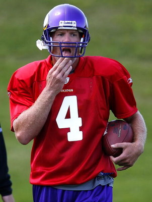 EDEN PRAIRIE, MN - AUGUST 18: Brett Favre #4 participates in a passing drill during a Minnesota Vikings practice session on August 18, 2009 at Winter Park in Eden Prairie, Minnesota. Favre has reportedly agreed to play for the Vikings, a reversal of his