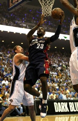 ORLANDO, FL - MAY 30:  LeBron James #23 of the Cleveland Cavaliers drives to the hoop against Hedo Turkoglu #15 of the Orlando Magic in Game Six of the Eastern Conference Finals during the 2009 Playoffs at Amway Arena on May 30, 2009 in Orlando, Florida. 