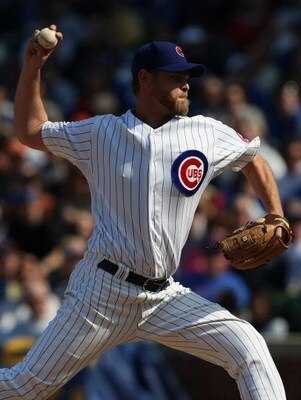 CHICAGO - APRIL 05: Closing pitcher Kerry Wood #34 of the Chicago Cubs delivers the ball in the 9th inning against the Houston Astros on his way to picking up his second save of the season on April 5, 2008 at Wrigley Field in Chicago, Illinois. The Cubs d