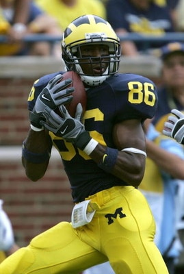 ANN ARBOR, MI - SEPTEMBER 23:  Mario Manningham #86 of the Michigan Wolverines catches a touchdown pass in the 2nd half against the Wisconsin Badgers on September 23, 2006 at Michigan Stadium in Ann Arbor, Michigan. Michigan defeated Wisconsin 27-13.  (Ph