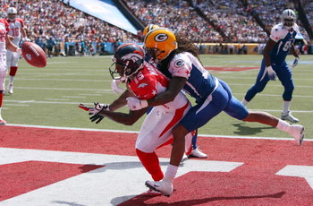 HONOLULU, HI - FEBRUARY 08: Wide receiver Brandon Marshall #15 of the AFC All-Stars Denver Broncos tries to catch an end zone pass broken up by cornerback Al Harris #31 of the the NFC All-Stars Green Bay Packers in the 2009 NFL Pro Bowl at Aloha Stadium o