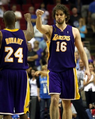 ORLANDO, FL - JUNE 11:  Pau Gasol #16 and Kobe Bryant #24 of the Los Angeles Lakers celebrate in overtime before defeating the Orlando Magic 99-91 in Game Four of the 2009 NBA Finals on June 11, 2009 at Amway Arena in Orlando, Florida.  NOTE TO USER:  Use