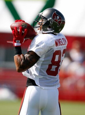 TAMPA, FL - AUGUST 01:  Tight end Kellen Winslow #82 of the Tampa Bay Buccaneers catches a pass during Training Camp at One Buccaneer Place on August 1, 2009 in Tampa, Florida.  (Photo by J. Meric/Getty Images)