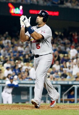 LOS ANGELES, CA - AUGUST 17:  Albert Pujols #5 of the St. Louis Cardinals celebrates after hitting a solo home run in the fourth inning against the Los Angeles Dodgers at Dodger Stadium on August 17, 2009 in Los Angeles, California.  (Photo by Jeff Gross/