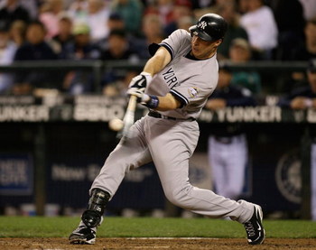 SEATTLE  - AUGUST 14:  Mark Teixeira #25 of the New York Yankees hits a solo home run in the ninth inning to take a 3-2 lead over the Seattle Mariners on August 14, 2009 at Safeco Field in Seattle, Washington. (Photo by Otto Greule Jr/Getty Images)