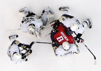 WASHINGTON - MAY 13:  Alex Ovechkin #8 of the Washington Capitals is surrounded by Pittsburgh Penguins during Game Seven of the Eastern Conference Semifinal Round of the 2009 Stanley Cup Playoffs at Verizon Center May 13, 2009 in Washington, DC. The Pengu
