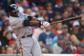 BOSTON - MAY 17:  Mike Cameron #25 of the Milwaukee Brewers connects for a two-run home run against the Boston Red Sox at Fenway Park on May 17, 2008 in Boston, Massachusetts. (Photo by Jim Rogash/Getty Images)