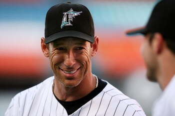 MIAMI - JUNE 07: Outfielder Luis Gonzalez #26 of the Florida Marlins warms up prior to playing against the Cincinnati Reds at Dolphin Stadium June 7, 2008 in Miami, Florida.  (Photo by Marc Serota/Getty Images)