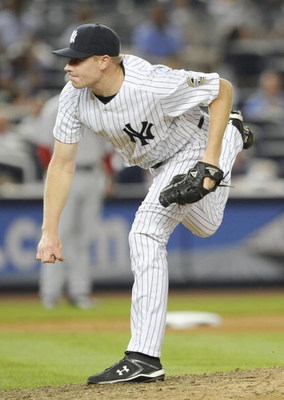 NEW YORK - AUGUST 06: Relief pitcher Mark Melancon #39 of the New York Yankees follows through on a pitch in the 8th inning of the AL baseball game against the Boston Red Sox at Yankee Stadium on August 6, 2009 in New York, New York.  (Photo by Paul Beres