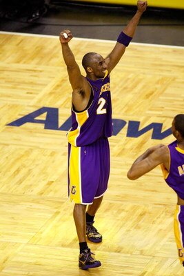 ORLANDO, FL - JUNE 14:  Kobe Bryant #24 of the Los Angeles Lakers celebrates as the Lakers' defeat the Orlando Magic in Game Five of the 2009 NBA Finals on June 14, 2009 at Amway Arena in Orlando, Florida.  The Lakers won 99-86.  NOTE TO USER:  User expre