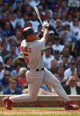 CHICAGO - MAY 21:  Albert Pujois #5 of the St. Louis Cardinals hits a two-run home run in the fifth inning against the Chicago Cubs on May 21, 2004 at Wrigley Field in Chicago, Illinois. The Cardinals defeated the Cubs 7-6. (Photo by Jonathan Daniel/Getty