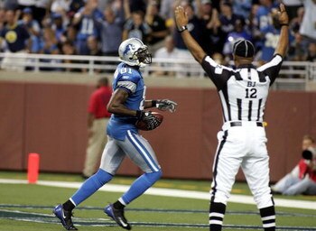 DETROIT - SEPTEMBER 14:  Calvin Johnson #81 of the Detroit Lions runs into the end zone for a fourth-quarter touchdown during the Green Bay Packers vs. Detroit Lions on September 14, 2008 at Ford Field in Detroit, Michigan.  (Photo by Domenic Centofanti/G