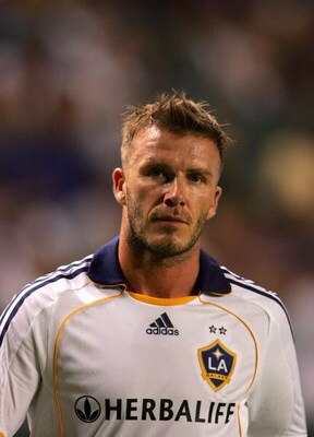 CARSON, CA - AUGUST 15:  David Beckham #23 of the Los Angeles Galaxy walks off the pitch after being red-carded on a studs up tackle against Peter Vagenas #8 of Seattle Sounders FC in the first half during the MLS match at The Home Depot Center on August 