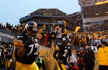 PITTSBURGH - JANUARY 11:  (L-R) Darnell Stapleton #72 and Dennis Dixon #2 of the Pittsburgh Steelers take the field against the San Diego Chargers during their AFC Divisional Playoff Game on January 11, 2009 at Heinz Field in Pittsburgh, Pennsylvania. The