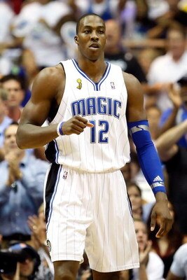 ORLANDO, FL - JUNE 14:  Dwight Howard #12 of the Orlando Magic reacts in the first quarter of Game Five of the 2009 NBA Finals against the Los Angeles Lakers on June 14, 2009 at Amway Arena in Orlando, Florida.  NOTE TO USER:  User expressly acknowledges 
