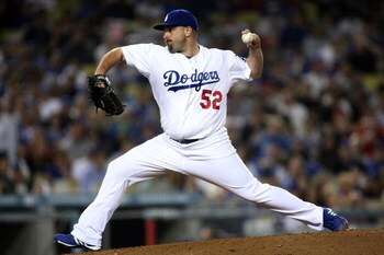 LOS ANGELES - AUGUST 18:  Reliever George Sherrill #52 of the Los Angeles Dodgers throws a pitch against the St. Louis Cardinals at Dodger Stadium August 18, 2009 in Los Angeles, California.  The Dodgers won 7-3.  (Photo by Stephen Dunn/Getty Images)