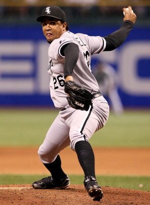 ST PETERSBURG, FL - OCTOBER 03:  Relief pitcher Octavio Dotel #26 of the Chicago White Sox pitches against the Tampa Bay Rays in Game 2 of the American Leaugue Divisional Series at Tropicana Field on October 3, 2008 in St. Petersburg, Florida. The Rays de