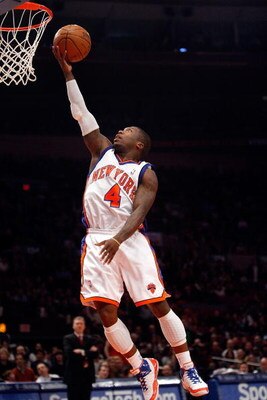 NEW YORK - MARCH 07: Nate Robinson #4 of the New York Knicks lays the ball up against the Charlotte Bobcats on March 7, 2009 at Madison Square Garden in New York City. NOTE TO USER: User expressly acknowledges and agrees that, by downloading and or using 