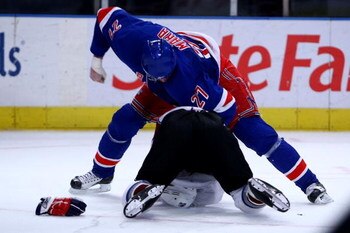 NEW YORK - FEBRUARY 28: Paul Mara #27 of the New York Rangers fights with Darcy Tucker #16 of the Colarado Avalanche during their game on February 28, 2009 at Madison Square Garden in New York City.  (Photo by Chris McGrath/Getty Images)