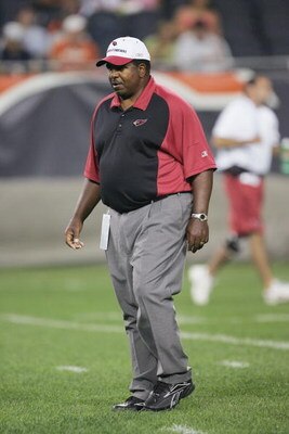 CHICAGO - AUGUST 25:  Head coach Dennis Green of the Arizona Cardinals walks on the field before a preseason game against the Chicago Bears on August 25, 2006 at Soldier Field in Chicago, Illinois. The Cardinals defeated the Bears 23-16. (Photo by Jonatha