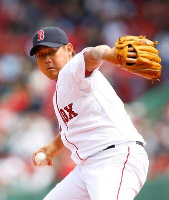 BOSTON - APRIL 9: Daisuke Matsuzaka #18 of the Boston Red Sox throws against the Tampa Bay Rays at Fenway Park April 9, 2009, in Boston, Massachusetts. The Rays won the game 4-3. (Photo by Jim Rogash/Getty Images)