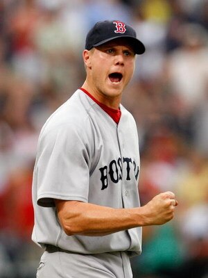 ATLANTA - JUNE 27:  Relief pitcher Jonathan Papelbon #58 of the Boston Red Sox reacts after defeating the Atlanta Braves 1-0 at Turner Field on June 27, 2009 in Atlanta, Georgia.  (Photo by Kevin C. Cox/Getty Images)